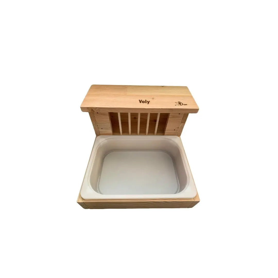 Litière avec râtelier pour lapin